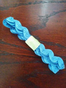 ribbon secured with scrapbook paper scraps